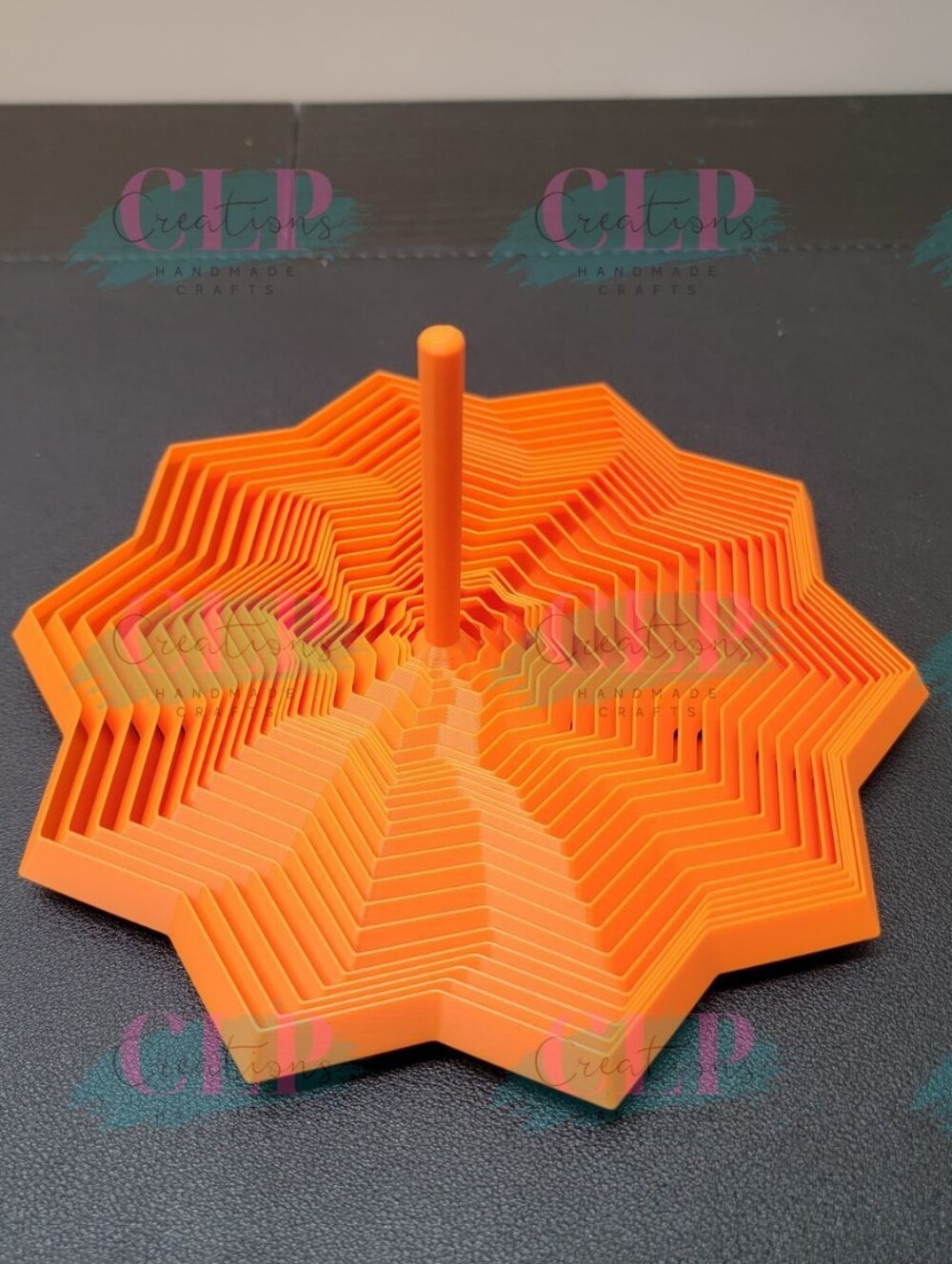 3D Printed Large Orange Geometric Star Spiral Fidget/Sensory toy